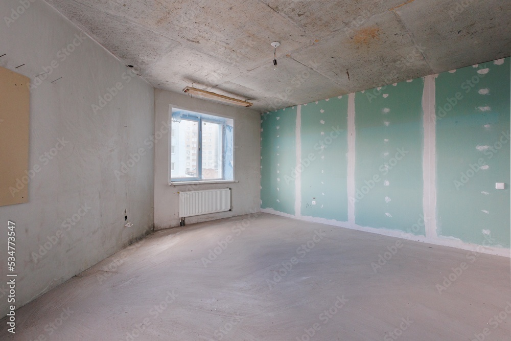 interior of the apartment without decoration in gray colors