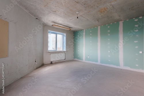 interior of the apartment without decoration in gray colors
