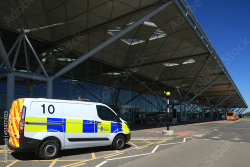 Police van outside passenger terminal building, London Stansted Airport, Stansted, Essex, England, UK
