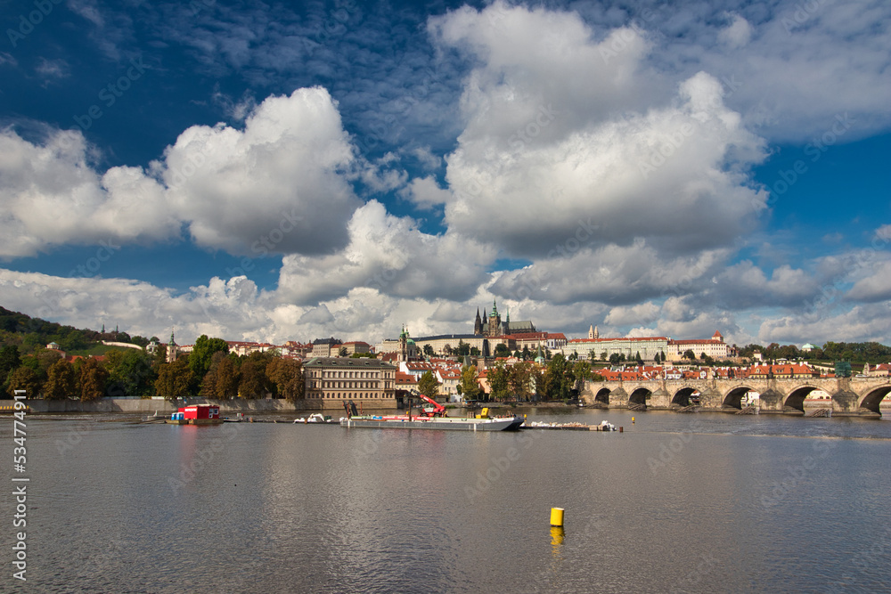 Panorama of Prague Castle and Charles bridge in autumn sunny day. Prague, Czech Republic.	