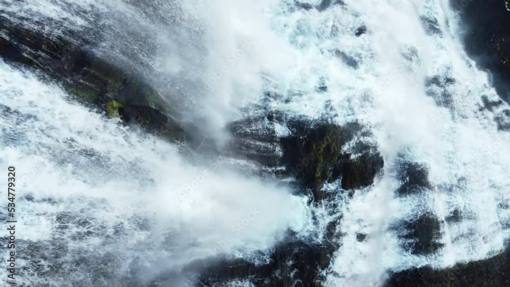 Dynjandi Waterfall in Iceland, huge cascade of water in the mountains, beautiful nature landscape, aerial top down view 4k Dynjandi Waterfall in Iceland, huge cascade of water in the mountains, beautiful nature landscape, aerial top down view 4k