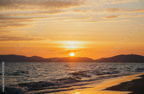 beautiful sunset on the sea in the evening © wannapong