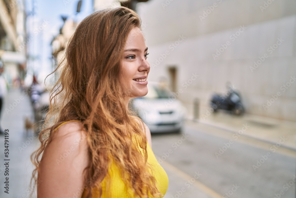 Young caucasian girl smiling confident at street