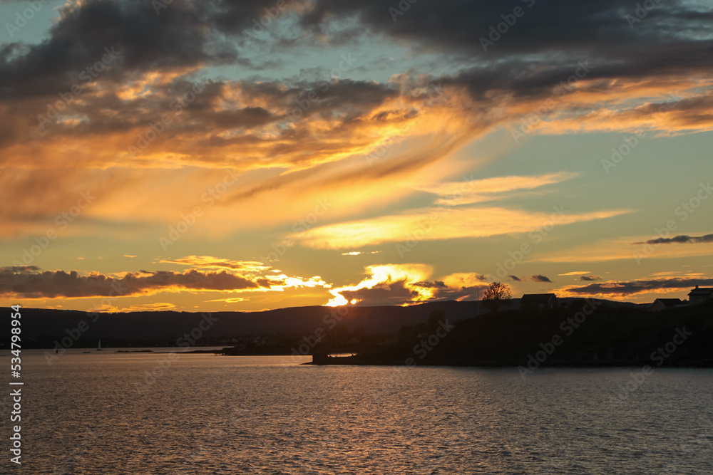 sunset over the mountains and water - Oslofjord