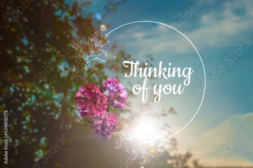 The inscription  thinking of you on a blurred background nature.