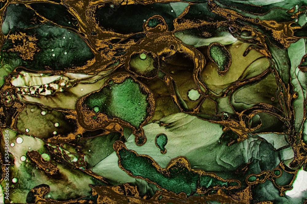 Dark green ink filled areas with golden dust in some areas of Alcohol ink fluid abstract texture fluid art with gold glitter and liquid.