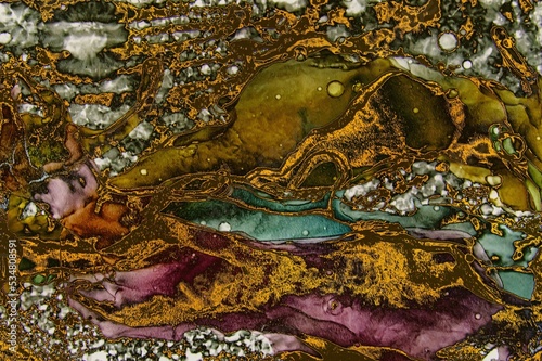 Old and rough looking golden dust on Alcohol ink fluid abstract texture fluid art with gold glitter and liquid.