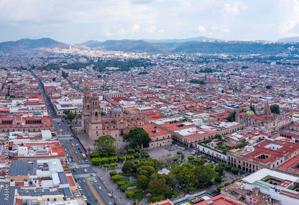 Aerial: panoramic view of the landscape and cityscape in Morelia, Michoacan, Mexico. Drone view
