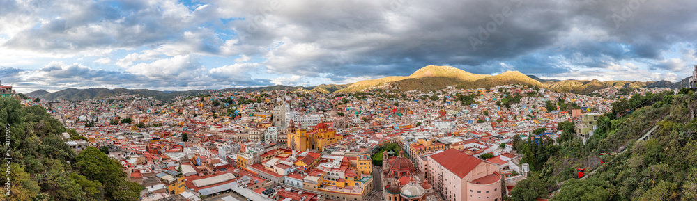 Aerial: epic view of the landscape and cityscape in Guanajuato. Drone view
