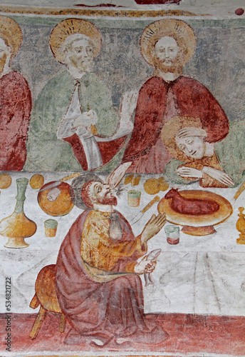 l'Ultima Cena (particolare). Affresco nella chiesetta dei Santi Ippolito e Cassiano a Castel Tesino (Trentino)