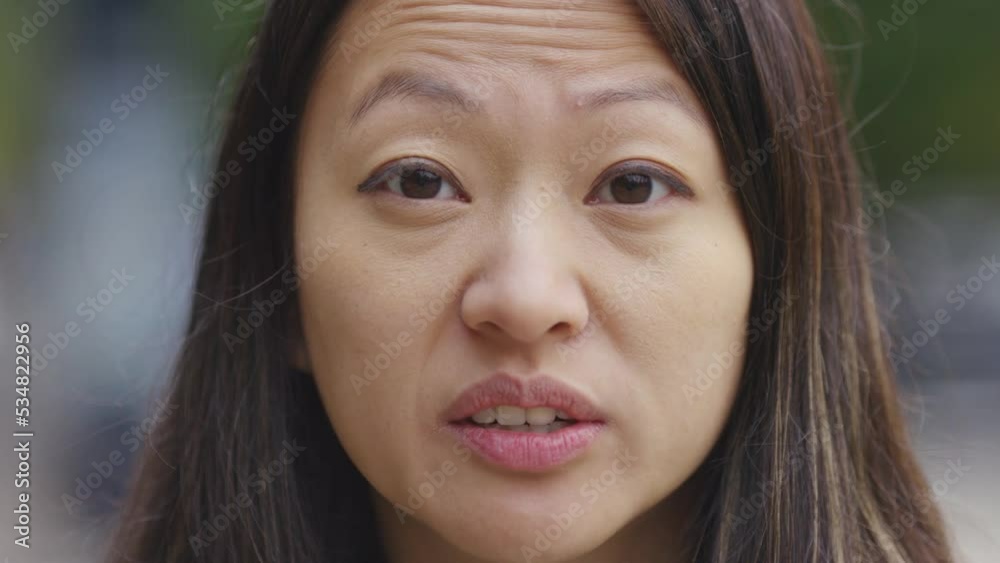 Angry young female talking to camera with a frustrated expression, in slow motion Angry young female talking to camera with a frustrated expression, in slow motion