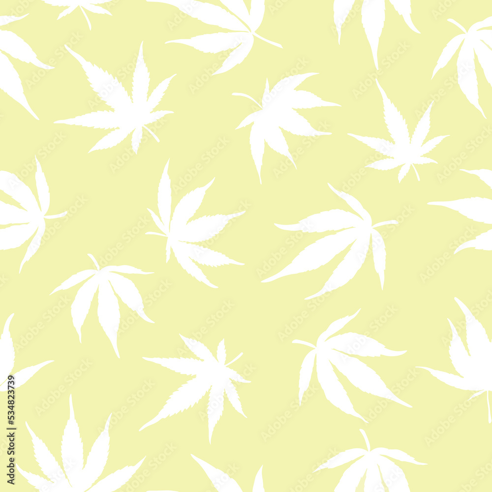 Pattern of cannabis. White hemp leaves on a yellow background. Pattern of cannabis. White hemp leaves on a yellow background.