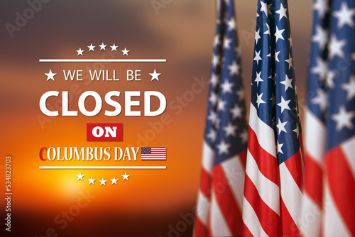 Columbus Day Background Design. American flag on background of sunset sky with a message. We will be Closed on Columbus Day. photo