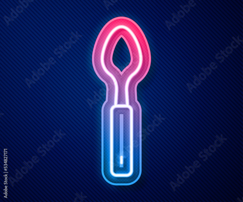 Glowing neon line Spoon icon isolated on blue background. Cooking utensil. Cutlery sign. Vector