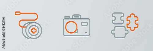 Set line Puzzle pieces toy, Yoyo and Photo camera icon. Vector