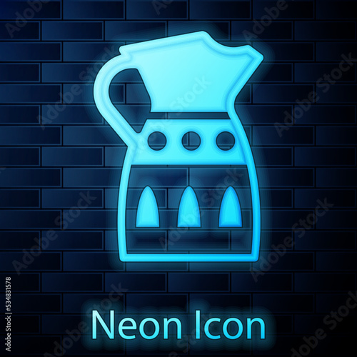 Glowing neon Sangria pitcher icon isolated on brick wall background. Traditional spanish drink. Vector