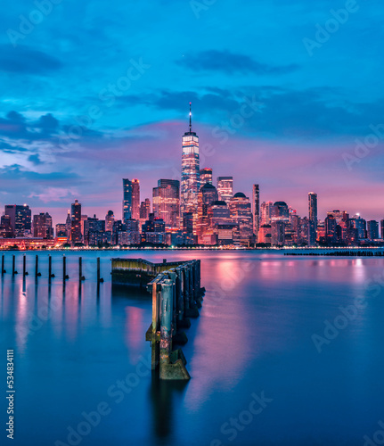 Canvas Print city skyline at sunrise beautiful New York Manhattan sky colors river water refl