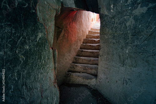 Stairs in old underground chalky cave monastery photo