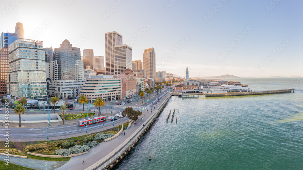 Aerial: San Francisco cityscape and harbor. Drone view 
