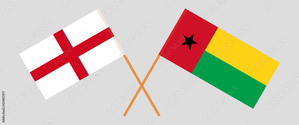 Crossed flags of England and Guinea-Bissau. Official colors. Correct proportion