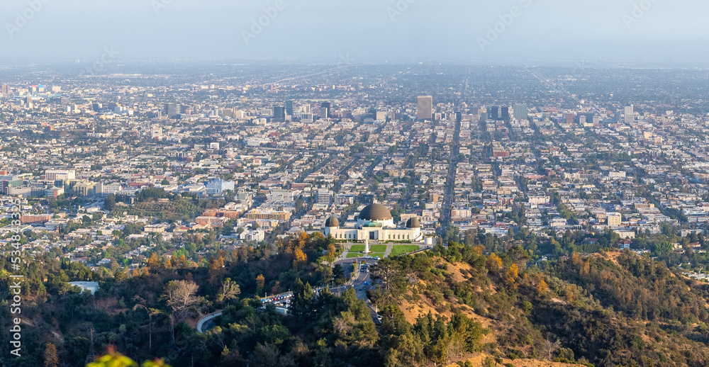 Griffith Observatory and Los Angeles cityscape view from the hills 