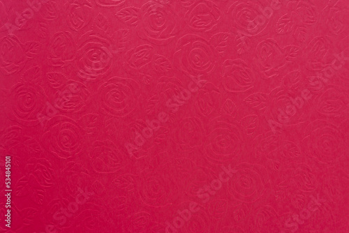 grungy red paper background with roses