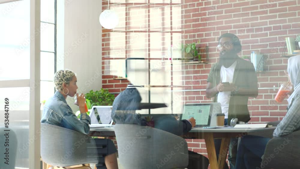 Business man, tech and team speaker from India in a teamwork, collaboration and strategy meeting. Corporate global digital marketing manager with phone and staff with technology for b2b web planning