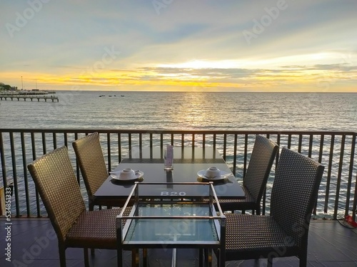 Thai restaurant at sunset reserved for customer dinner on the beach in Thailand © rprisarn