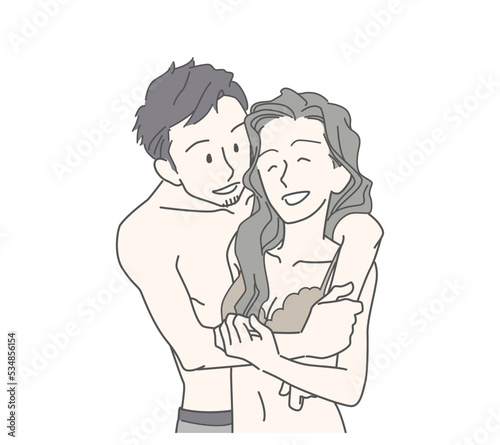 リラックスして抱き合う40代くらいのカップル　バックハグ　男女　恋人　恋愛