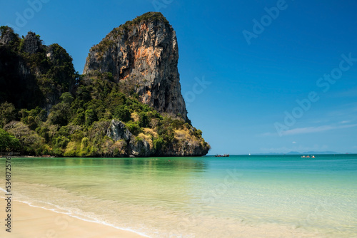 Railay west beach with limestone mountain and blue sky in Krabi
