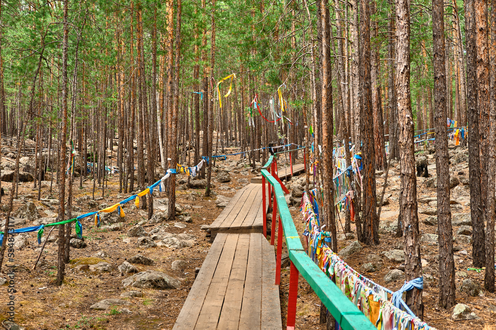 Fototapeta premium Datsan - Palace of the goddess Yanzhima on a clear summer day, Barguzinskaya Valley, Buryatia, Russia.