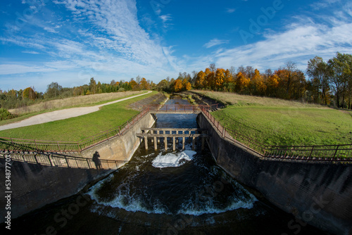 Lake river dam in autumn