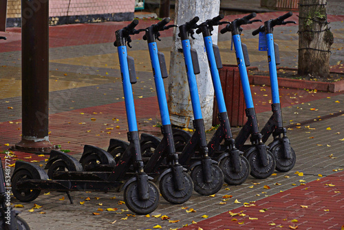 Obraz na płótnie Group of scooters on autumn street. w salonie