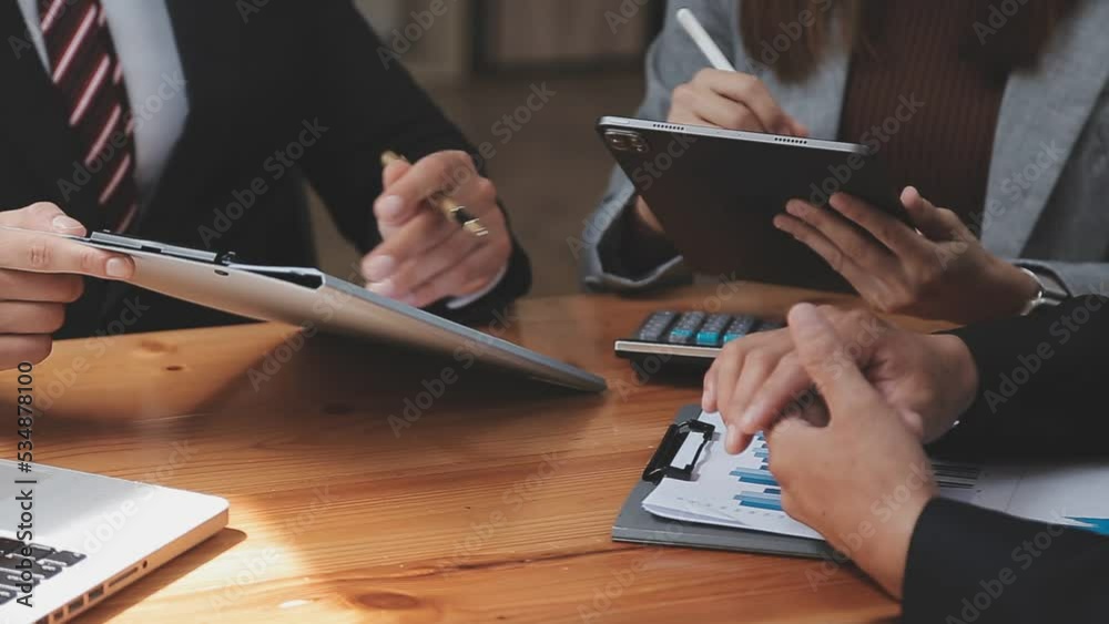 Businessman working with smart phone and laptop and digital tablet computer in office with digital marketing media in virtual icon Businessman working with smart phone and laptop and digital tablet computer in office with digital marketing media in virtual icon