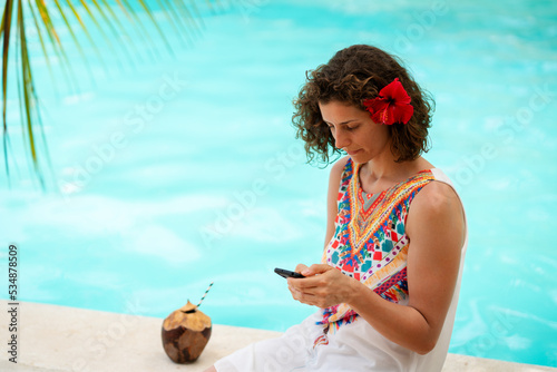 Beautiful woman at an exotic resort