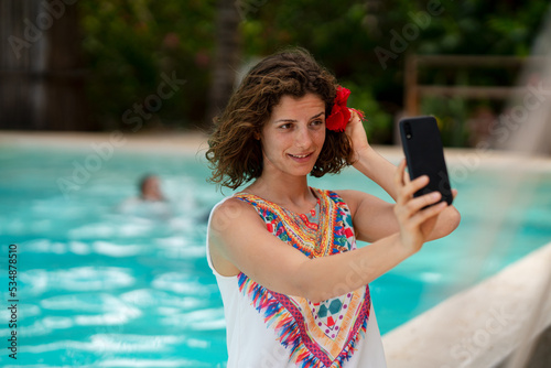 Beautiful woman at an exotic resort