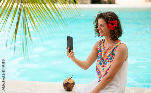 Beautiful woman at an exotic resort