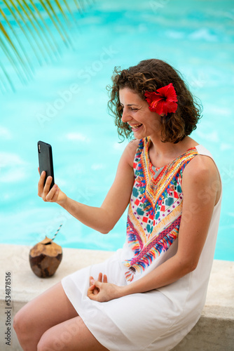 Beautiful woman at an exotic resort