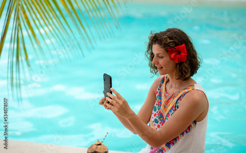 Beautiful woman at an exotic resort