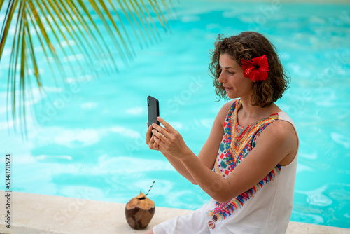 Beautiful woman at an exotic resort
