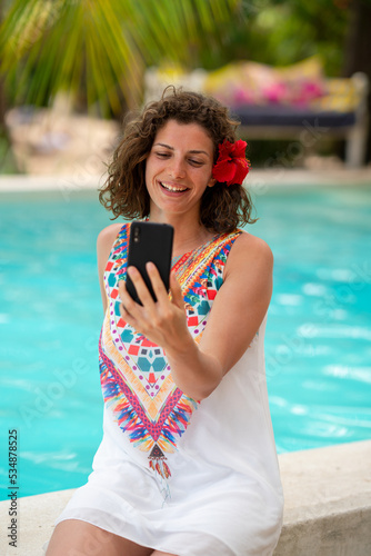 Beautiful woman at an exotic resort