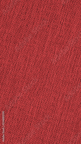Dark red woven surface close-up. Textile texture similar to linen fabric. Net vertical background. Textured mobile phone wallpaper. Macro © Deacon docs