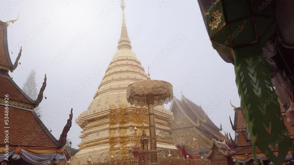view of golden pagoda Phrathat Doi Suthep Temple in chiang mai northern of Thailand in slowmotion