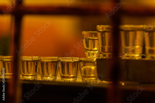 Vials of oil prepared for lighting the Hanukkah menorah in a window in Jerusalem during the eight-day Jewish festival of lights. photo