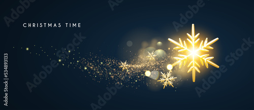 Gold Christmas snowflakes with bokeh effect.