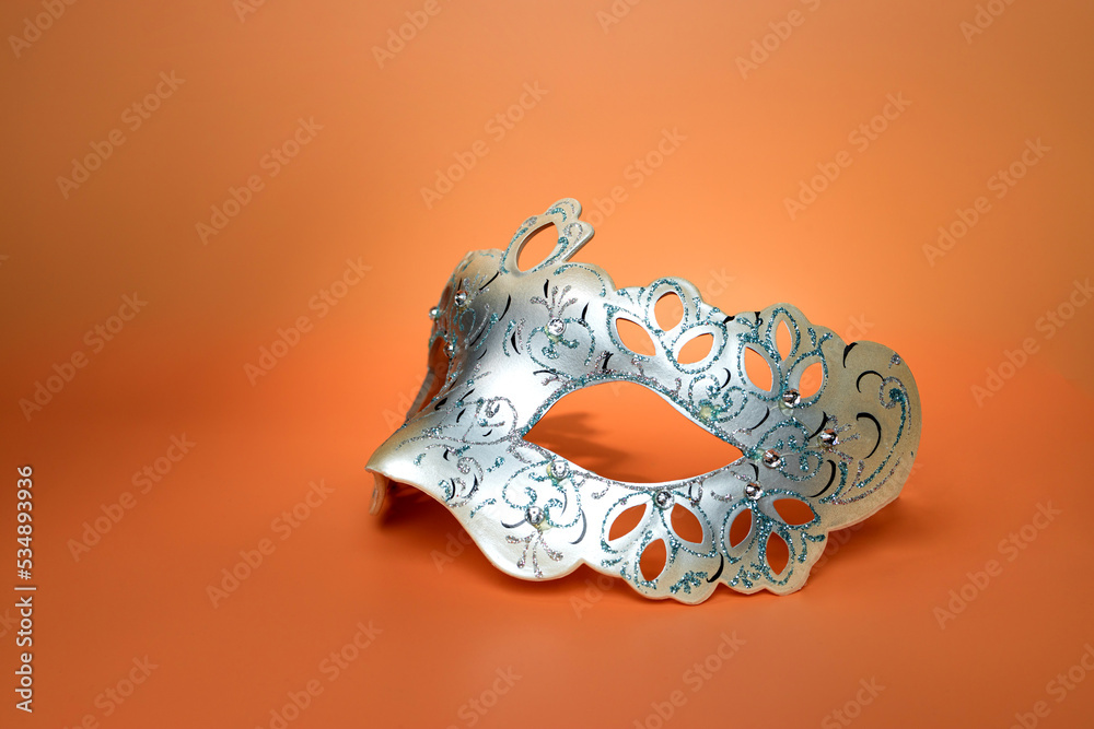 Fototapeta premium carnival mask on brown background