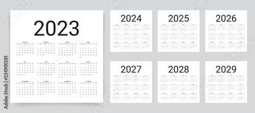 2023, 2024, 2025, 2026, 2027, 2028, 2029 years calendar. Calender layout. Week starts Sunday. Desk planner template with 12 months. Square organizer grid. Yearly stationery diary. Vector illustration photo