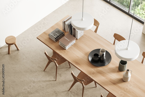 Top view of meeting corner interior with table and chairs, panoramic window
