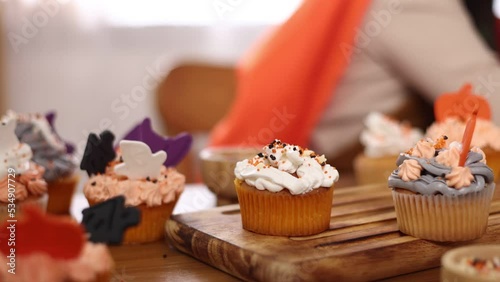 Happy halloween holiday, holiday and baking cookies at home.