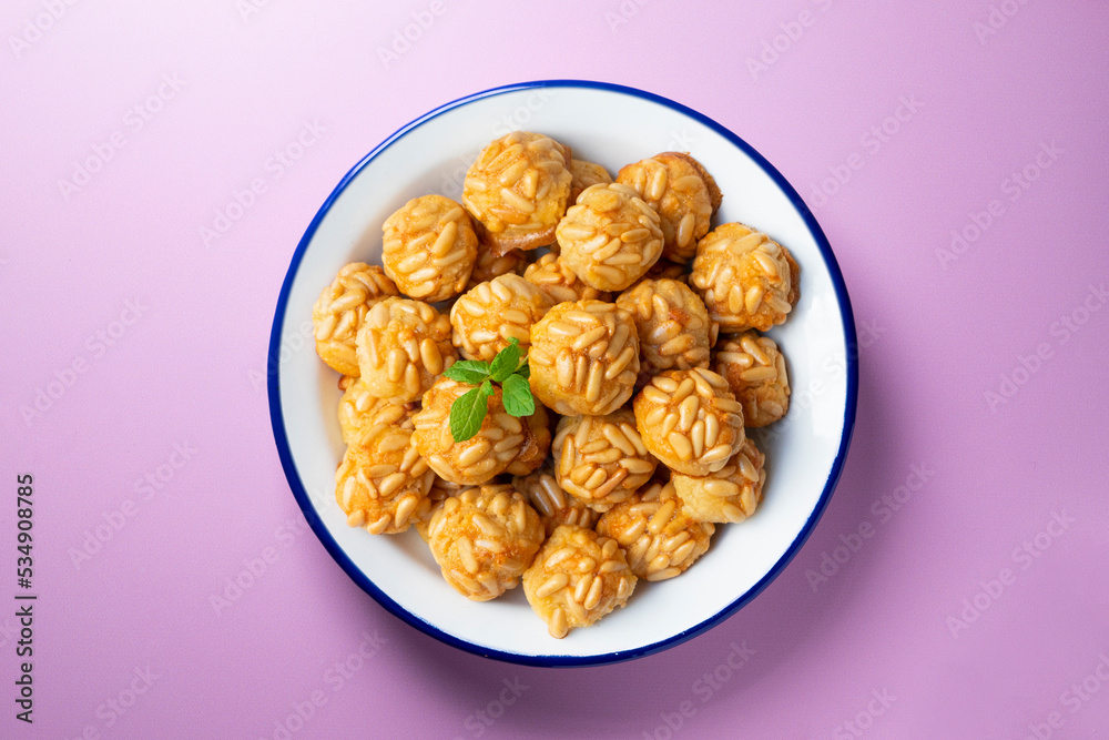 Pine nut penelles. Traditional autumn recipe for desserts made with marzipan in Barcelona Pine nut penelles. Traditional autumn recipe for desserts made with marzipan in Barcelona